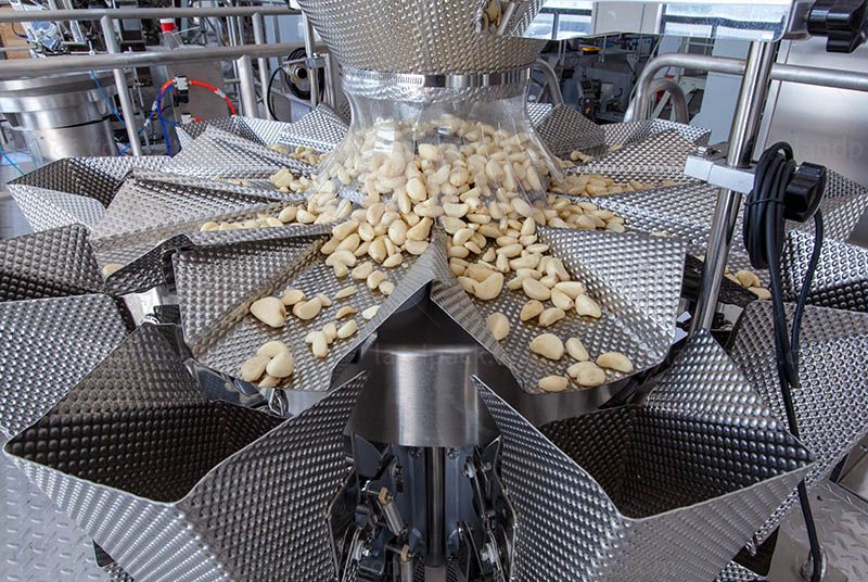 Pickles Achar Packing Machine | Automatic Premade Zipper Pouch Packaging Machine